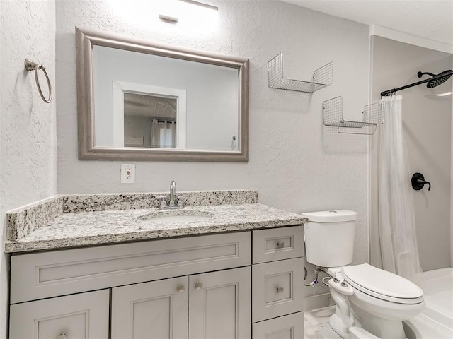 bathroom with a shower with curtain, vanity, and toilet