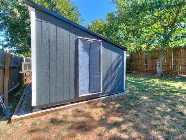 view of outdoor structure with a lawn