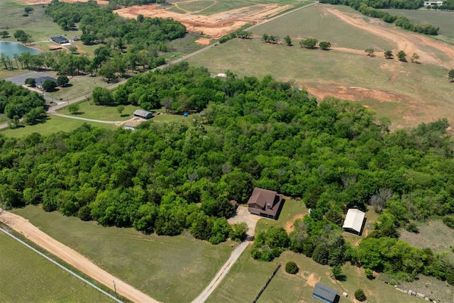 drone / aerial view with a water view and a rural view