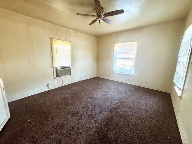 carpeted empty room featuring ceiling fan and cooling unit