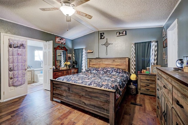 bedroom featuring a textured ceiling, wood finished floors, ornamental molding, and vaulted ceiling