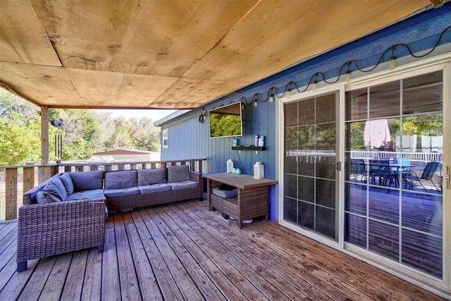 deck with an outdoor hangout area