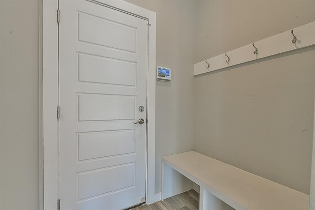 mudroom with light hardwood / wood-style floors