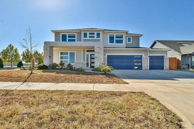 view of front of property featuring a garage