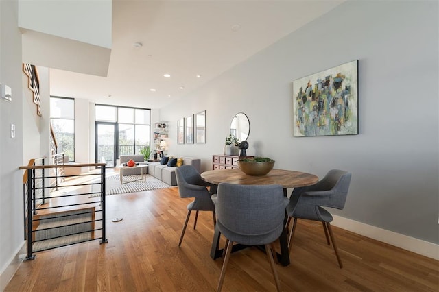 dining room with hardwood / wood-style floors