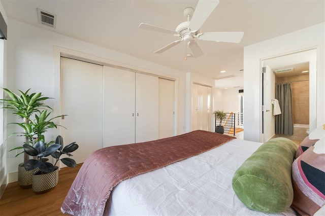 bedroom with wood-type flooring and ceiling fan