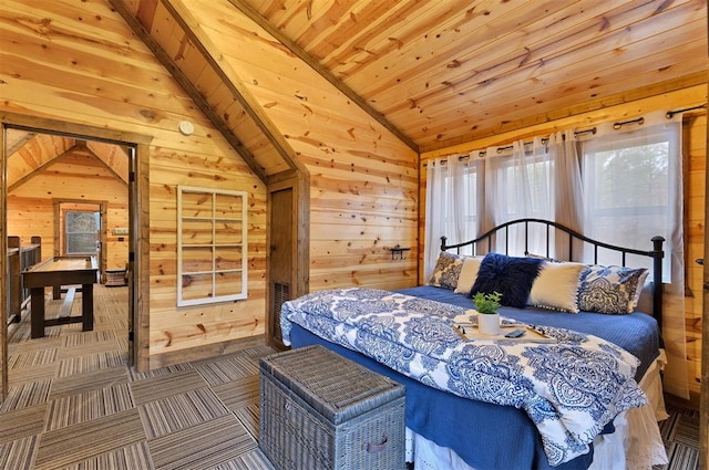 bedroom with carpet floors, vaulted ceiling, wood ceiling, and wood walls