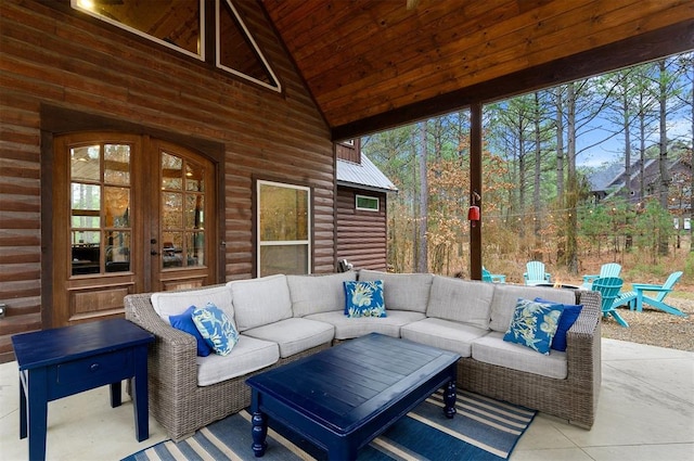 view of patio with an outdoor living space and french doors