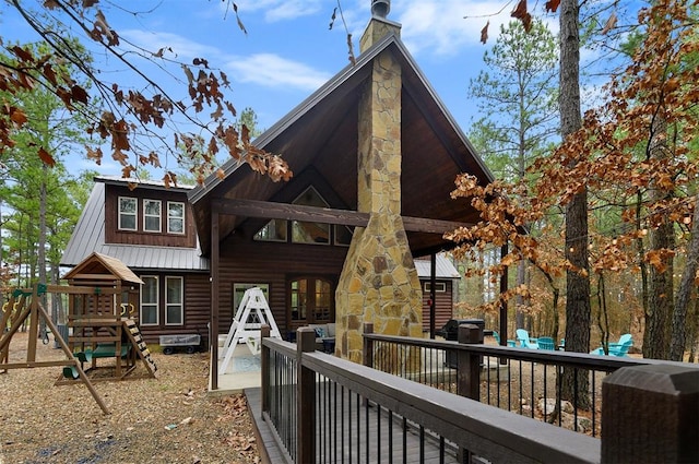 rear view of property with a deck