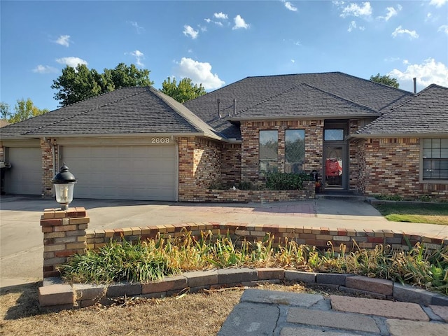 view of front of home with a garage