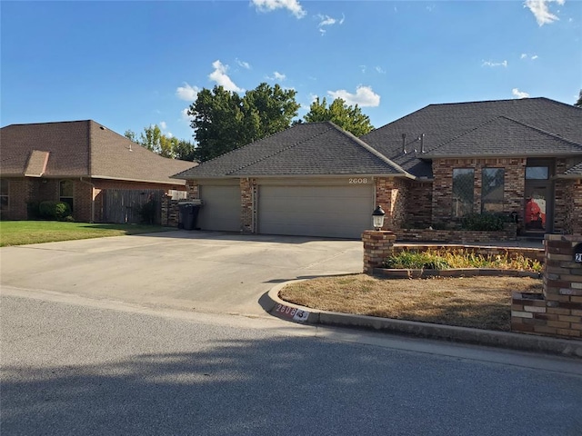 view of front of property with a garage