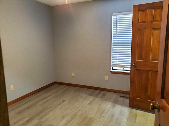 empty room featuring light hardwood / wood-style flooring