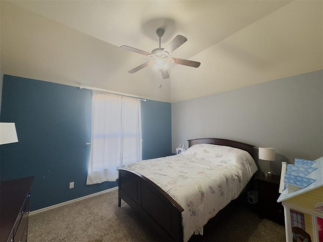 bedroom featuring carpet, vaulted ceiling, and ceiling fan