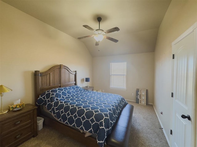 bedroom with carpet floors, vaulted ceiling, and ceiling fan