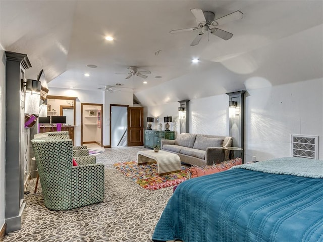 carpeted bedroom with vaulted ceiling and ceiling fan