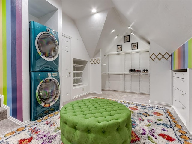 laundry area featuring carpet, built in features, and stacked washer / dryer