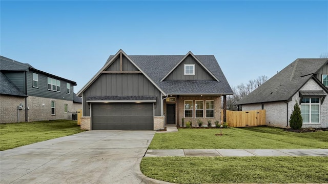 craftsman house with a garage, brick siding, concrete driveway, and a front lawn