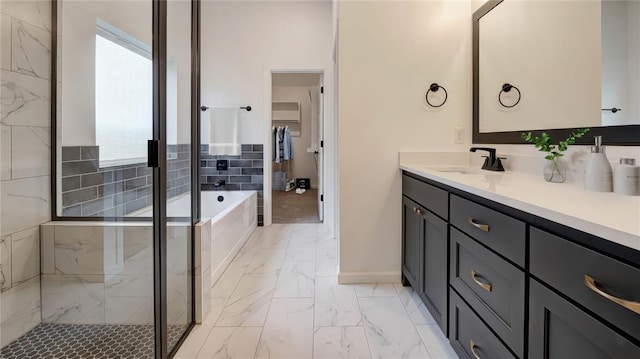 2348 Ridge Pine Rd, Edmond, OK 73034 - bathroom with marble look tiles, vanity, a bath, and a stall shower