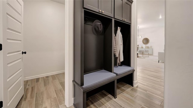 2348 Ridge Pine Rd, Edmond, OK 73034 - mudroom with light wood finished floors
