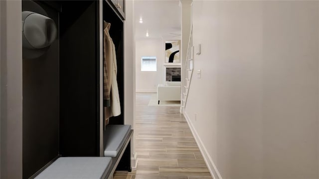 2348 Ridge Pine Rd, Edmond, OK 73034 - corridor featuring light wood-type flooring and baseboards