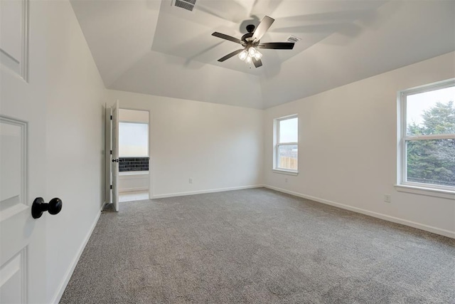 2348 Ridge Pine Rd, Edmond, OK 73034 - empty room with vaulted ceiling, carpet floors, and a ceiling fan