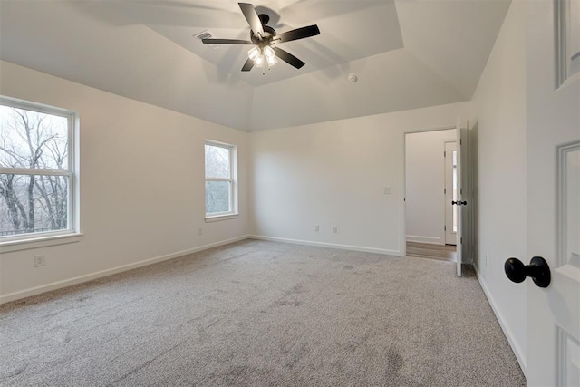 2348 Ridge Pine Rd, Edmond, OK 73034 - spare room with light carpet, ceiling fan, and lofted ceiling