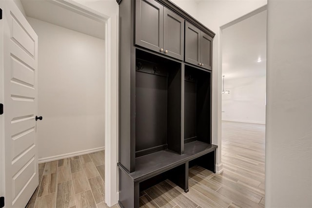 2348 Ridge Pine Rd, Edmond, OK 73034 - mudroom with light wood finished floors