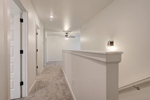 2348 Ridge Pine Rd, Edmond, OK 73034 - hallway with light colored carpet and baseboards