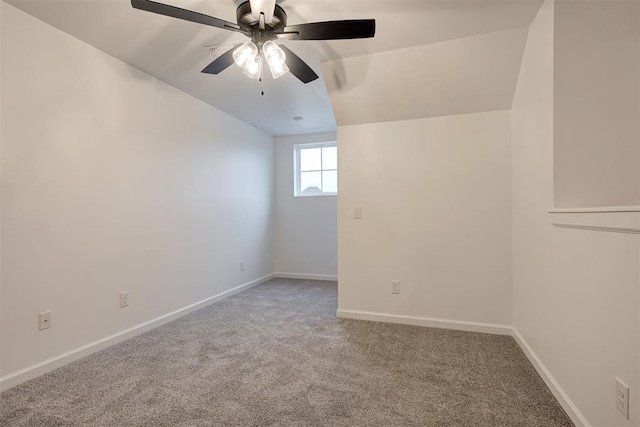 2348 Ridge Pine Rd, Edmond, OK 73034 - unfurnished room featuring vaulted ceiling, carpet, and a ceiling fan
