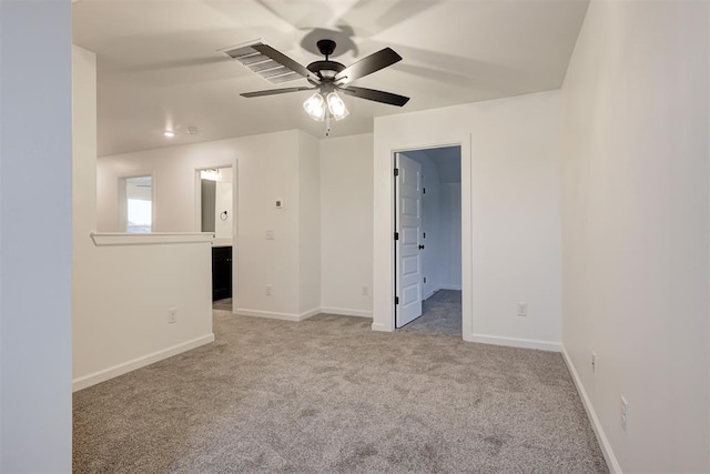 2348 Ridge Pine Rd, Edmond, OK 73034 - carpeted empty room featuring baseboards and ceiling fan
