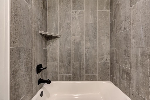 2348 Ridge Pine Rd, Edmond, OK 73034 - bathroom featuring shower / tub combination