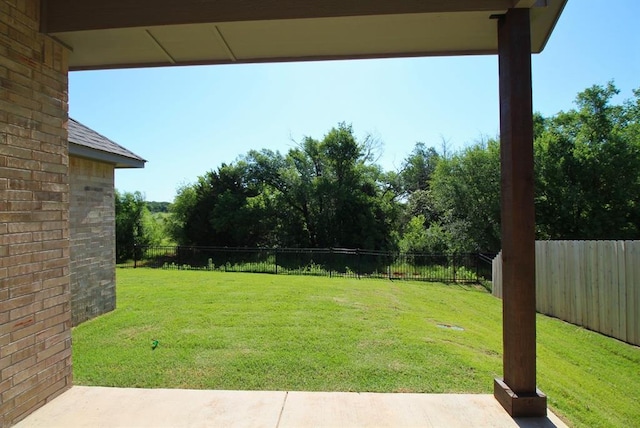 2348 Ridge Pine Rd, Edmond, OK 73034 - fenced backyard with a patio