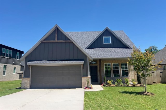 2348 Ridge Pine Rd, Edmond, OK 73034 - craftsman house with board and batten siding, a shingled roof, concrete driveway, and an attached garage