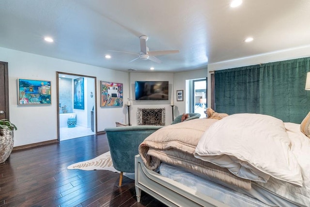 bedroom featuring ceiling fan, dark hardwood / wood-style flooring, and ensuite bathroom