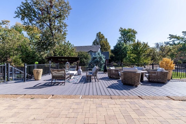 wooden deck with outdoor lounge area