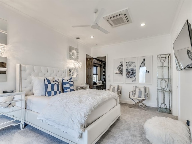 bedroom with ceiling fan, carpet floors, and crown molding