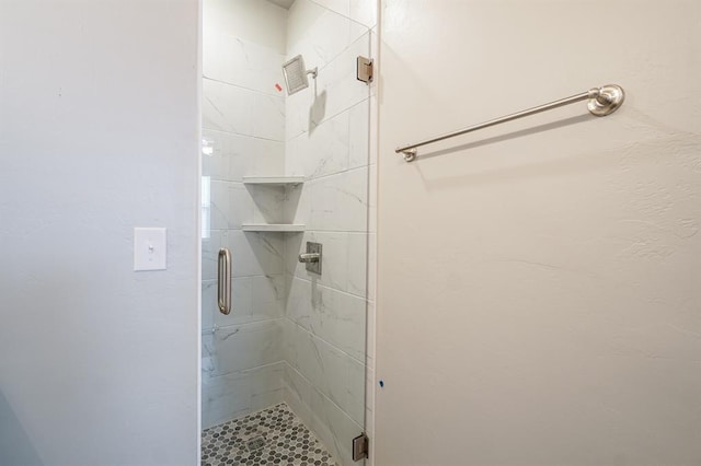 bathroom with an enclosed shower