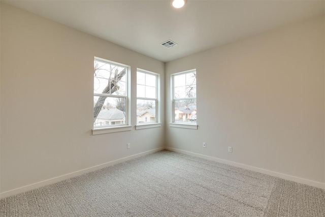 view of carpeted spare room