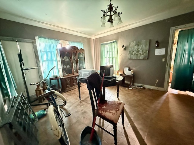 miscellaneous room with a chandelier, a healthy amount of sunlight, and ornamental molding