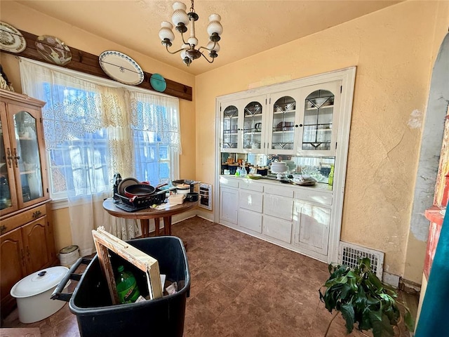 interior space with a chandelier