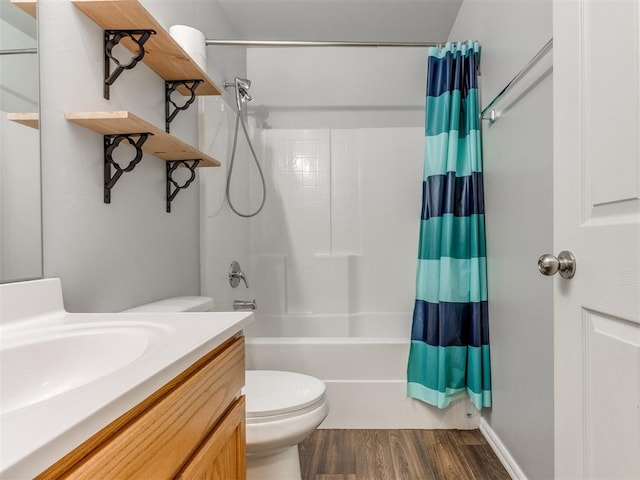 full bathroom with toilet, vanity, hardwood / wood-style flooring, and shower / tub combo with curtain