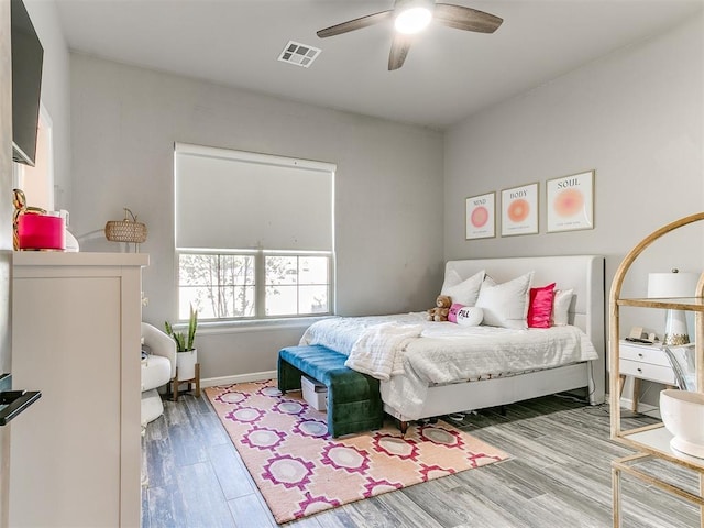 bedroom featuring ceiling fan and light hardwood / wood-style floors