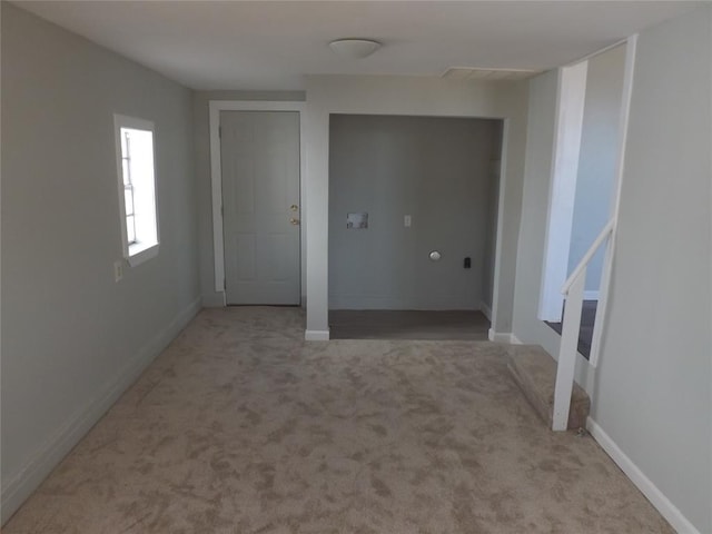 interior space with light colored carpet