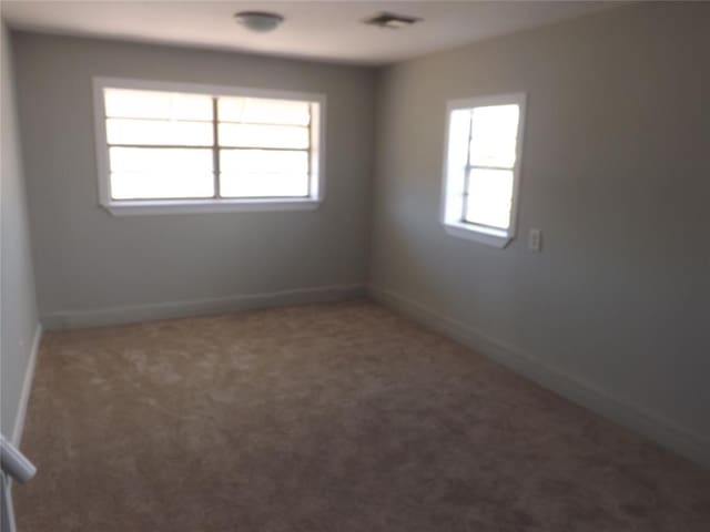 empty room with carpet floors