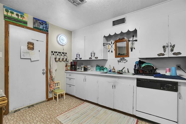 kitchen featuring white cabinetry, sink, white dishwasher, and a textured ceiling