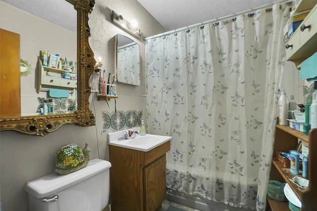 full bathroom featuring shower / bath combo with shower curtain, vanity, and toilet