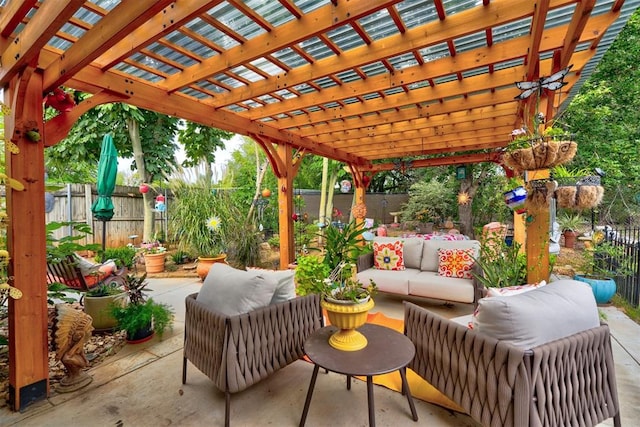 view of patio / terrace with a pergola and an outdoor living space