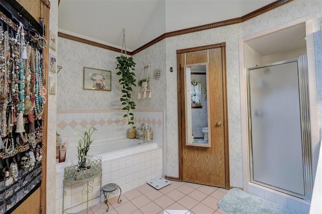 bathroom featuring shower with separate bathtub, tile patterned floors, and crown molding