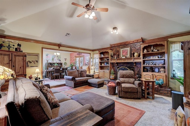 living room featuring vaulted ceiling, ceiling fan with notable chandelier, carpet flooring, ornamental molding, and a brick fireplace