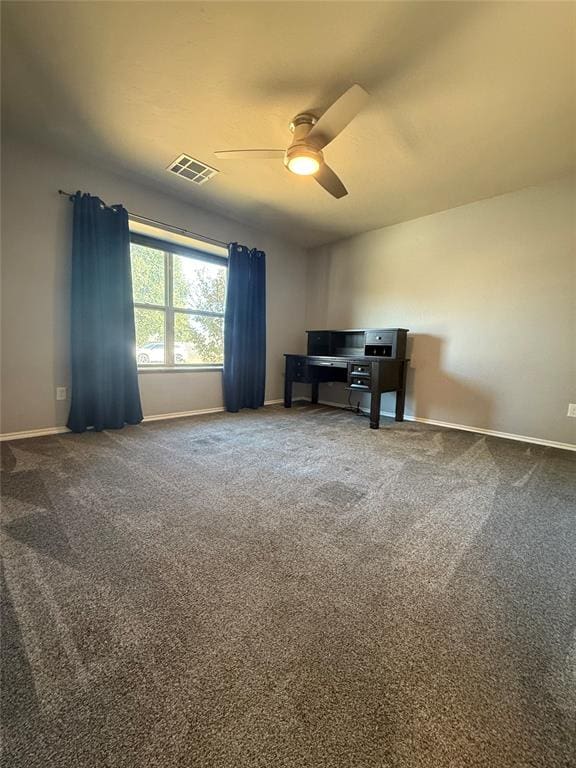 carpeted home office with ceiling fan